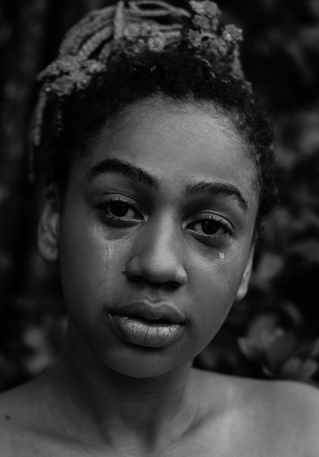 Abused woman crying