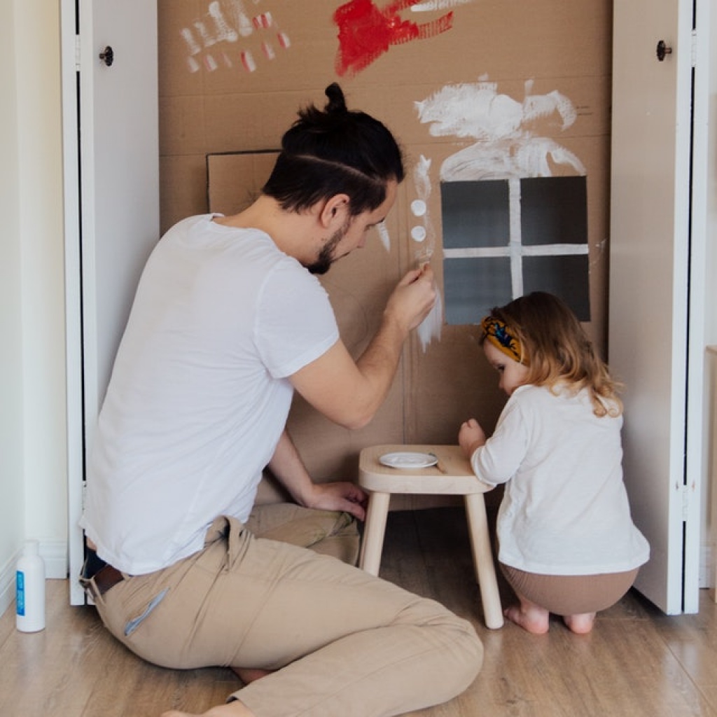 Dad and daughter doing DIY project together