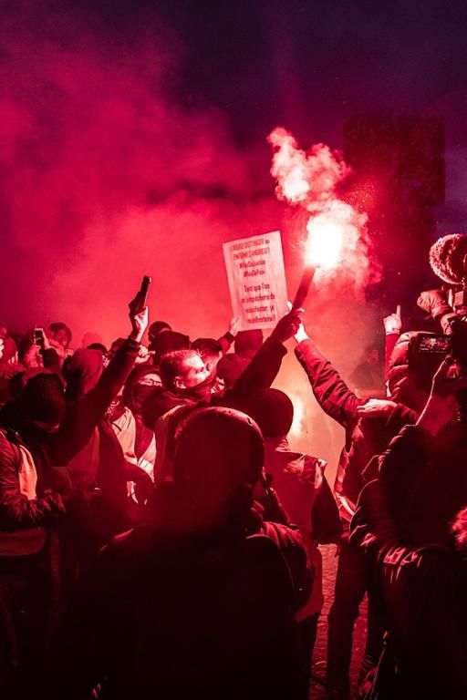 protesters holding night flair