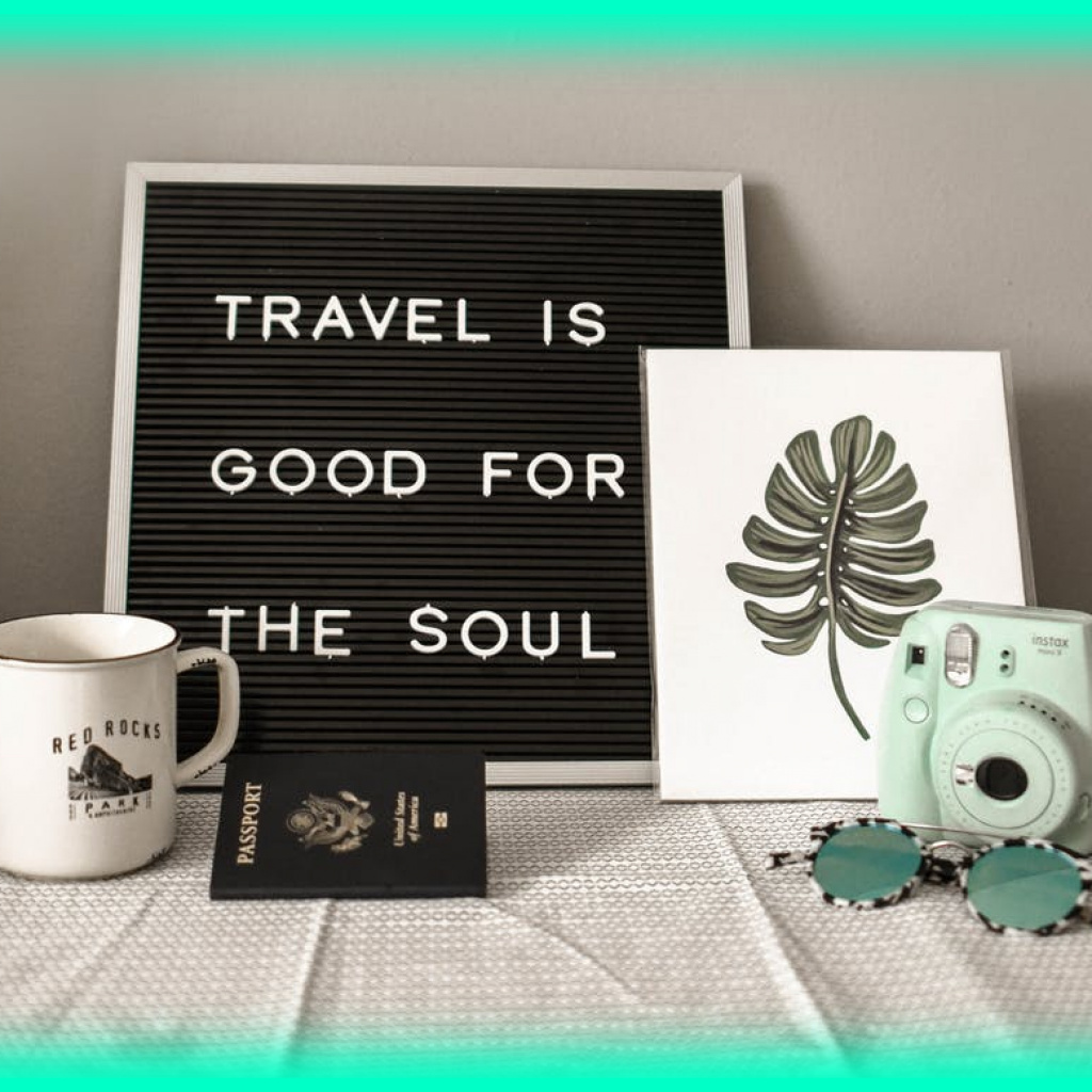 Sign that reads Travel is good for the soul