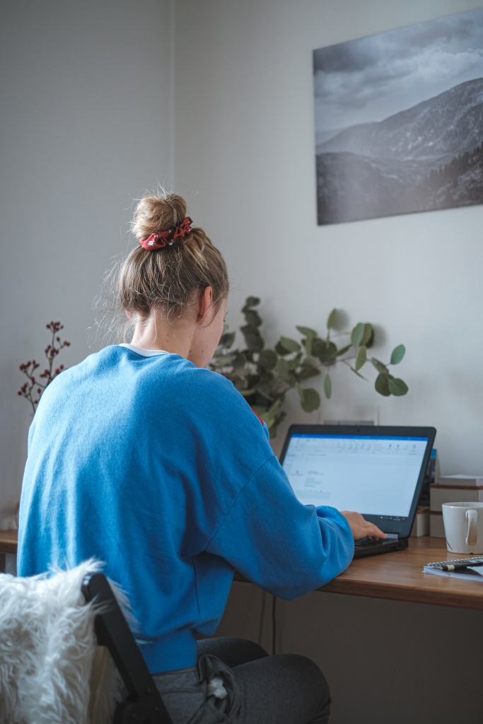 A woman using a laptop computer