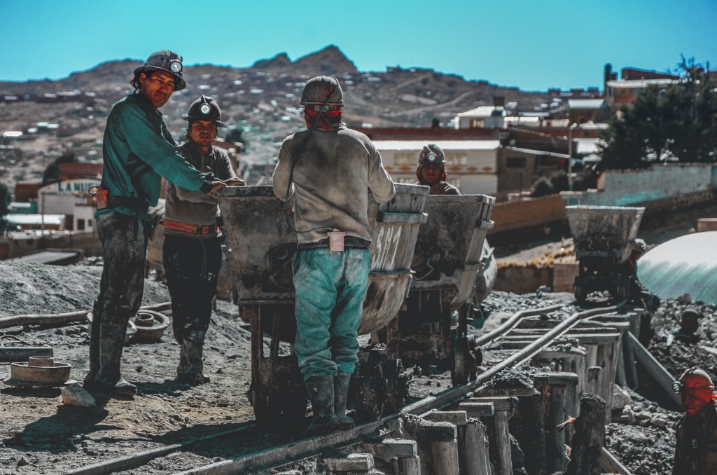 A group of miners talking