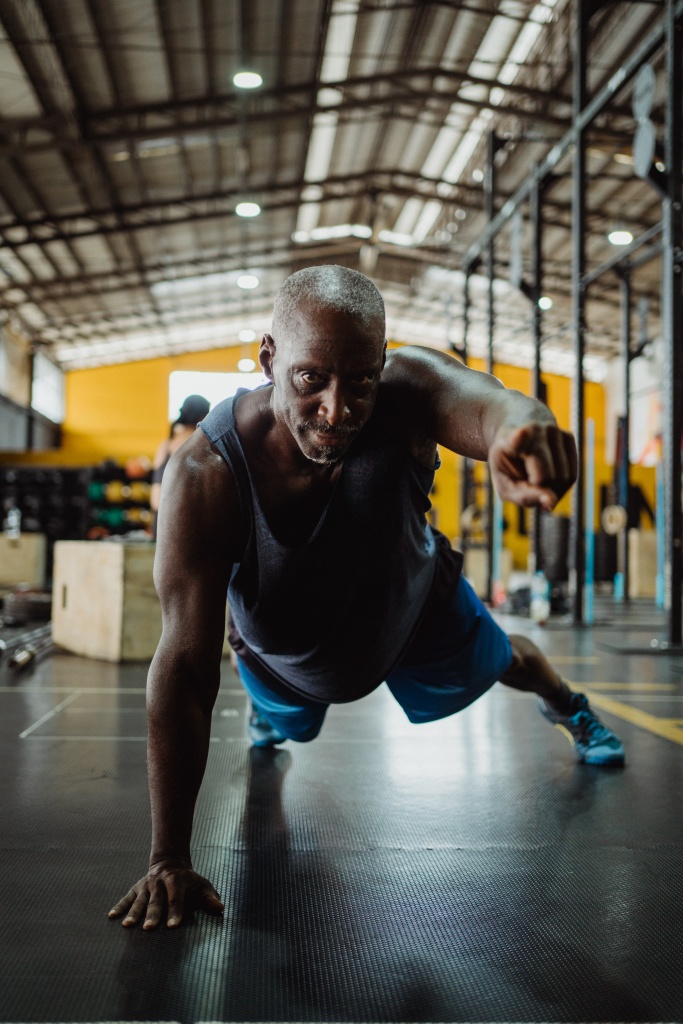 A man exercising and encouraging positivity